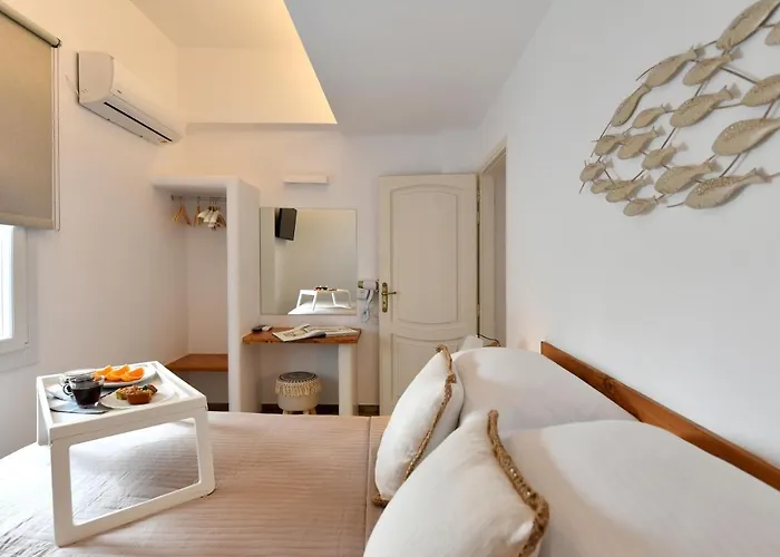 Отель Ammos Luxury &